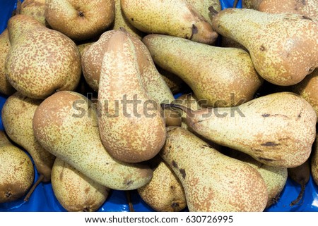 Background  picture of just picked Conference pears in a heap