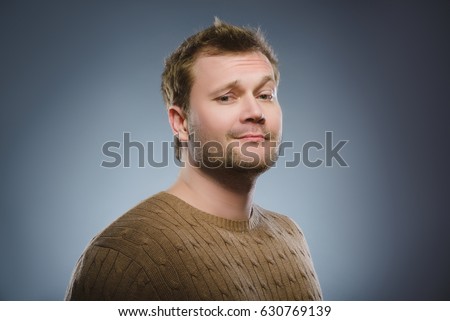 Arrogant bold self important stuck up man with napoleon complex Royalty-Free Stock Photo #630769139