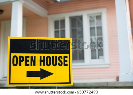 Open House Sign in Front of a Home

