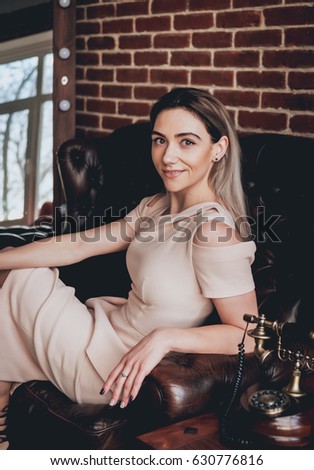 Modern business woman in the office. Beautiful background