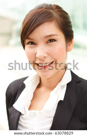 Bright closeup portrait of asian business woman