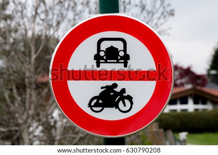 A traffic sign prohibiting access to automobiles and motorbikes