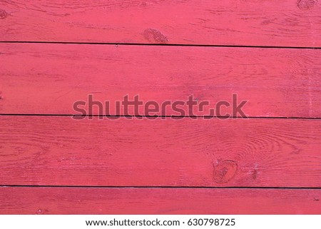 wooden boards painted red for the background