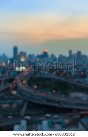 Aerial view blurred bokeh light city downtown, abstract background
