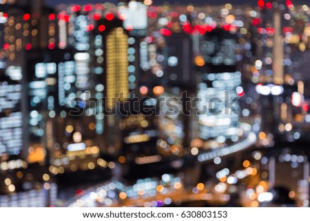 Night blurred bokeh light office building close up, abstract background