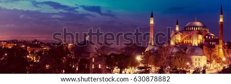 Hagia Sophia - ancient landmark of Istanbul at night for your travel horizontal banner. Panoramic view on Turkish Mosque with minarets. Ayasofya - Orthodox temple of Byzantine in Constantinople.