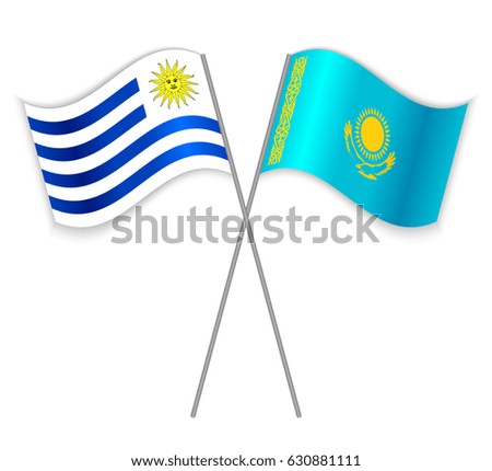 Uruguayan and Kazakh crossed flags. Uruguay combined with Kazakhstan isolated on white. Language learning, international business or travel concept.