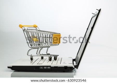 shopping cart and laptop