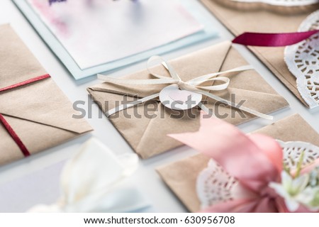 collection of envelopes or invitations isolated on white, wedding invitation card design concept 
