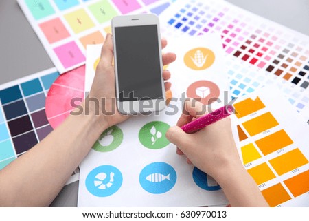 Young designer working in office, closeup