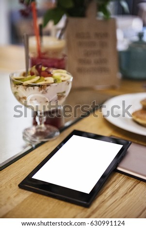 Breakfast with a tablet with copyspace