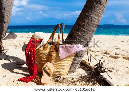 Rest in Paradise - Maldives - beach with sun hat, beach bag and flip flops