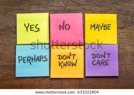 yes, no, maybe, perhaps, don't know, don't care -  undecided voter concept, colorful sticky notes against grunge rustic wood board Royalty-Free Stock Photo #631022804