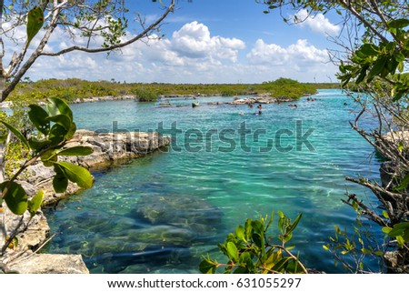 Yal-Ku Lagoon,  snorkeling holiday makers destination near Playa Del Carmen,Quintana Roo,Mexico Royalty-Free Stock Photo #631055297