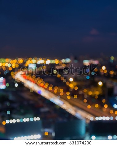 Blurred bokeh city road aerial view blue skyline, abstract background 