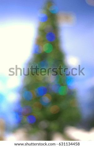 Blur light celebration on christmas tree, happy new year colorful background.