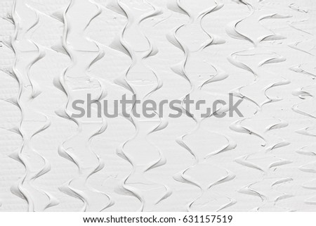 White relief design pattern, smooth stucco structure background with free space for text. Creamy texture creative backdrop.