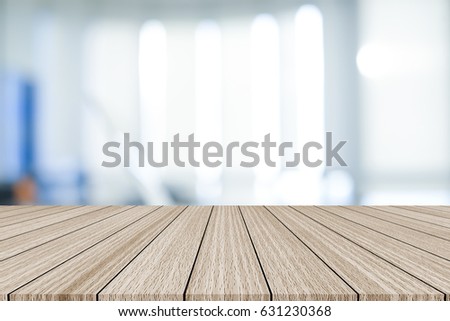 abstract blur grey and sepia tone color with grunge aged old wood striped perspective background:blurry brighten soft silver gray color backdrop with veneer panel plank.advertising products on display