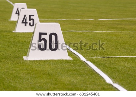 number fifty on a block in sport stadium