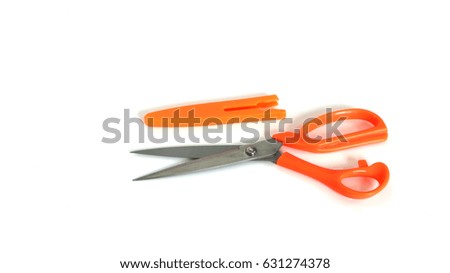 Orange scissors and protective casing for prevent dangers isolated on a white background