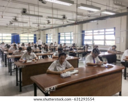 Blurred, Blurred Background, Blurred Abstract, Classroom with people. Students Sitting classroom and doing final exam.