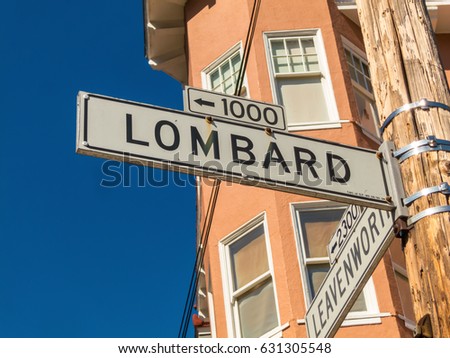 Street sign of the famous winding street Lombard in San Francisco, USA
