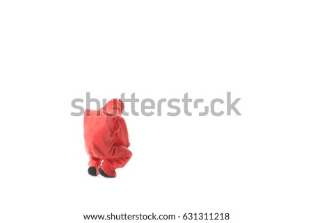Miniature people  firefightes in hazmat suits construction concept on white background with a space for text