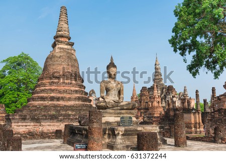 Big buddha at Wat Mahathat at Sukhothai Historical Park in the north of Thailand