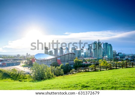 Beautiful Calgary city skyline from scotsman’s hill on a sunny day, Canada Royalty-Free Stock Photo #631372679