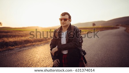 Man on the street in sunset