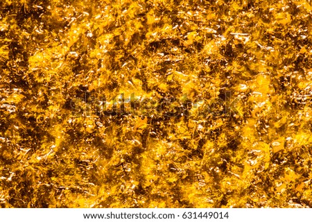 Golden abstract background texture.