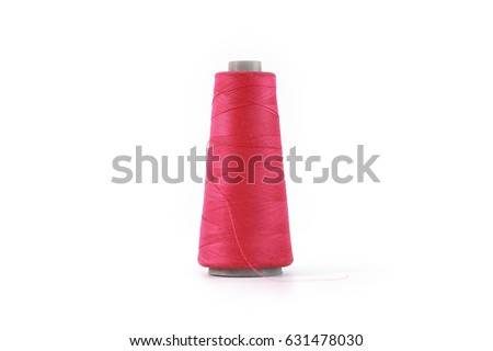 Red spool of thread isolated on white background Royalty-Free Stock Photo #631478030