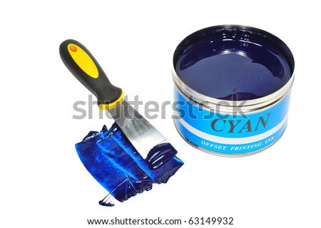 A Can Of Cyan Color Offset Printing Ink And A Ink Knife