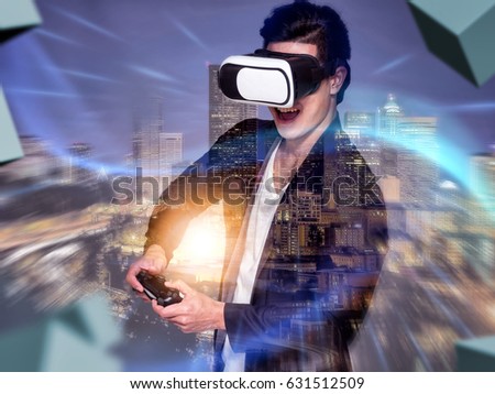 Visual reality concept.Young Asian business man using Visual reality or VR headset and interacting with object.man getting experience using VR-headset glasses.