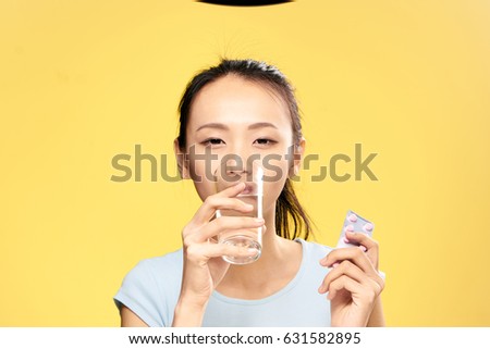 Woman taking pills