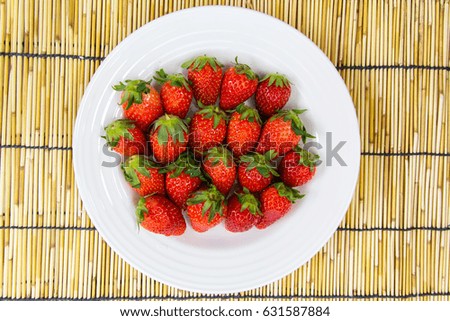Many red strawberry on basket for cooking on holiday