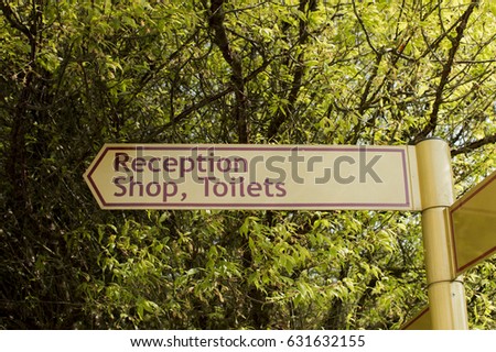 Reception, Shop, Toilets Signpost