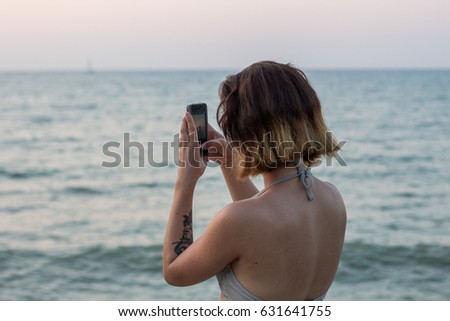 Millennial taking photo
