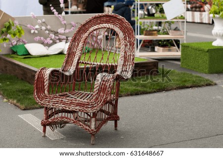 Wicker chair with border outdoor.