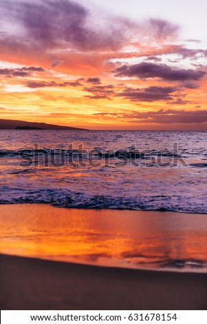 Beach sunset with reflection, Maui Hawaii
