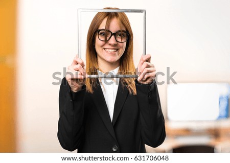 Young business woman with framework on unfocused background