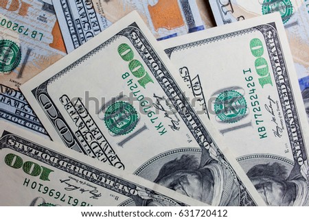 Many banknotes in face value of $ 100 on the front and back. Income, investment, successful business. Background close-up of US dollars / background texture of US dollars, many new US Dollar banknotes