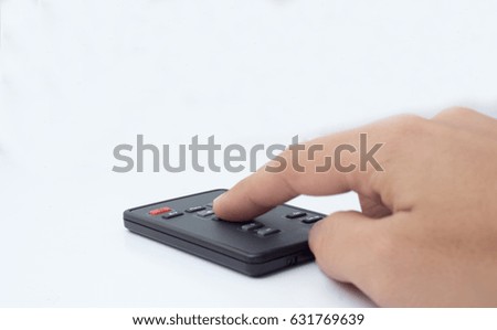 hand push remote on white background