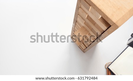 wooden block to make structure isolated on white background,planning in business model top view