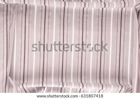 Texture, background, pattern. Woolen fabric is pale pink, striped.
Desktop wallpapers in the open air and a vacation with a picture. Black and white fabric fabric lines.
