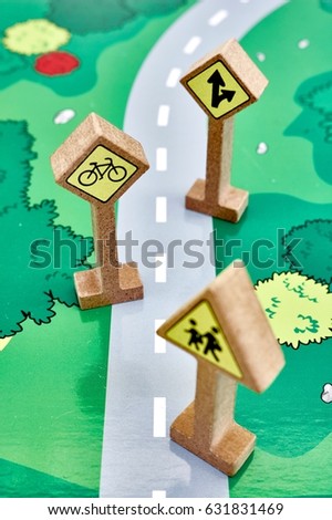 A studio photo of toy road signs