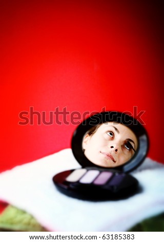 Cosmetics isolated on red background