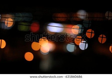 Abstract bokeh light in the dark background.