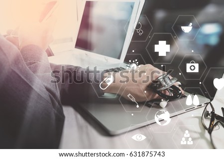 Medical technology concept. Doctor working with smartphone and stethoscope and digital tablet computer in modern office at hospital with computer interface icons diagram