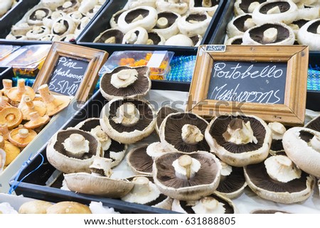 Close-up of fresh mushrooms in trays in the market